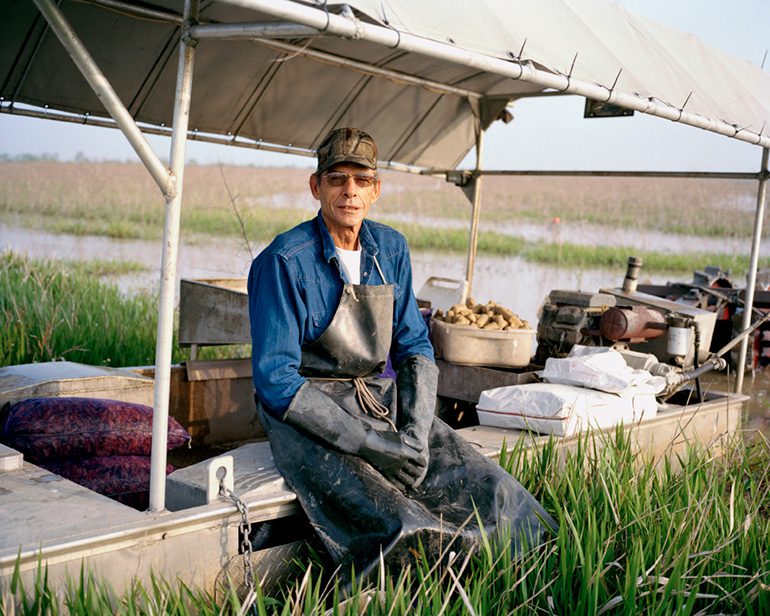 Photo by Michelle Bogre. Leo Smith, crawfish farmer, Gueydan, LA.