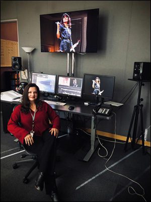 Heidi Scharfe, ACE in cutting room.
