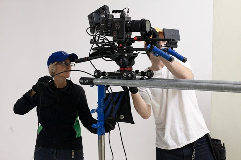Sasha Sibley and film crew on set. Filming debut feature film, "The Box"