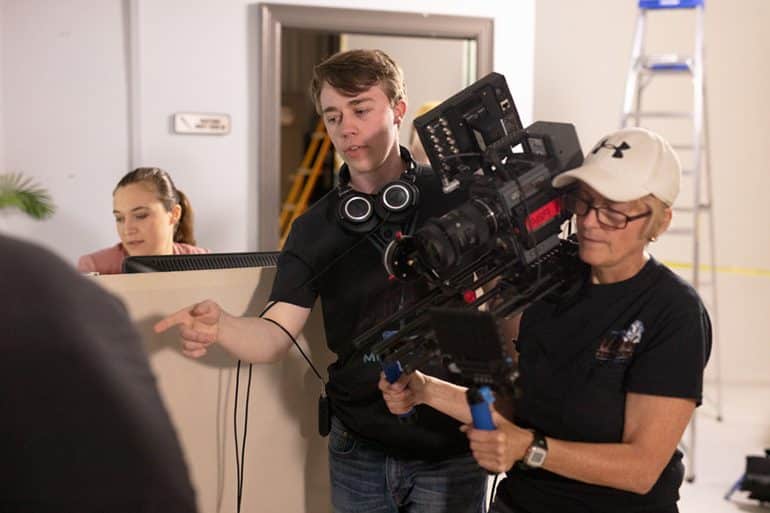 Sasha Sibley and film crew on set. Filming debut feature film, "The Box"