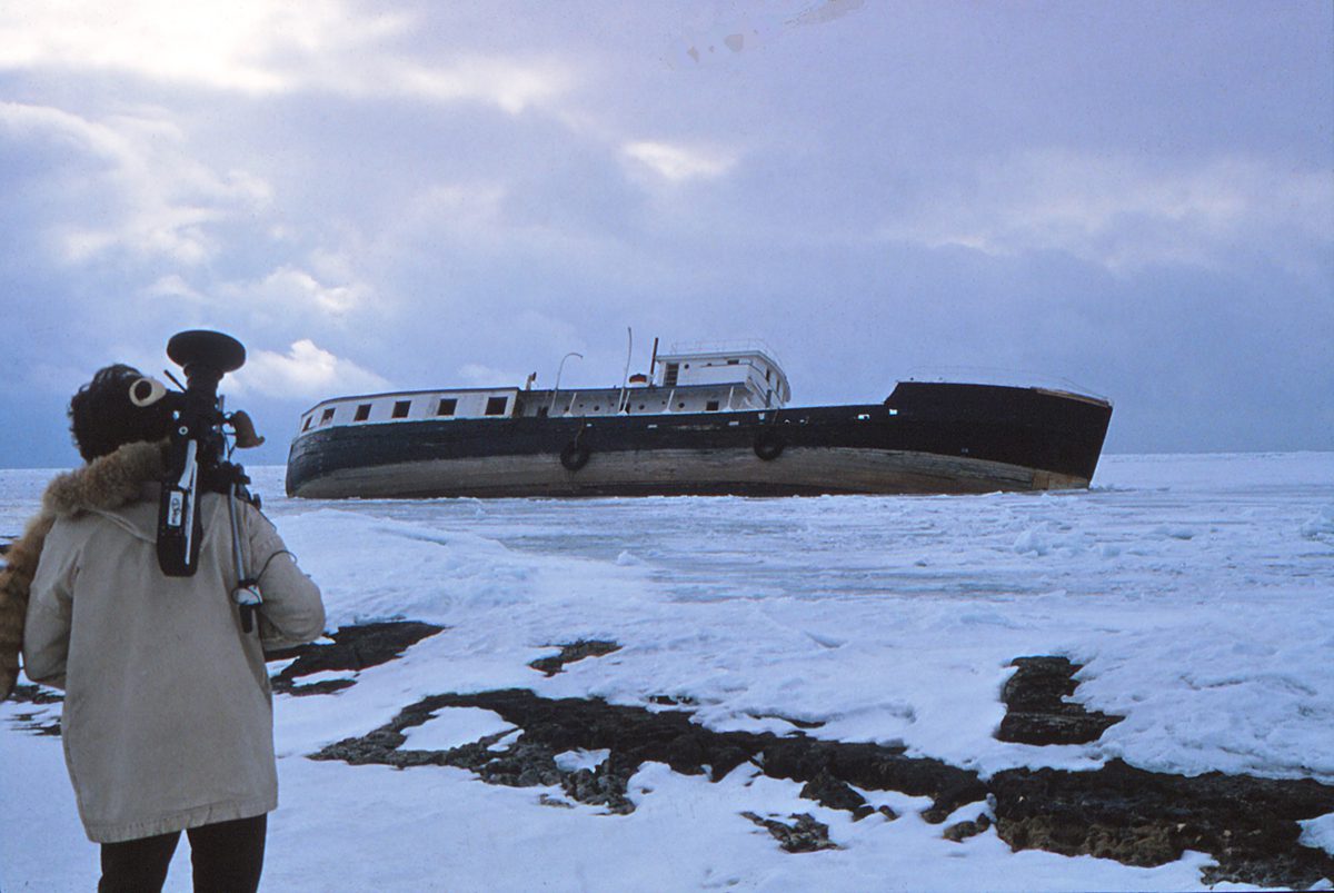 Walking across loose ice to the shipwreck.