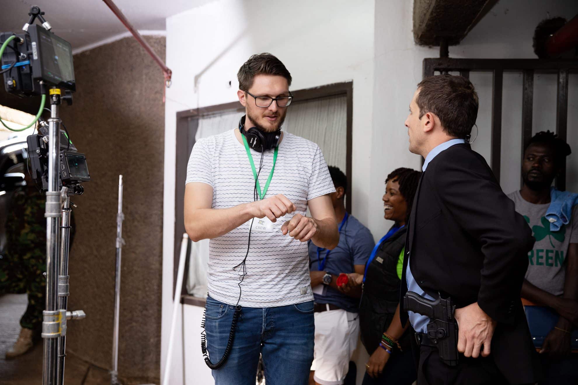 Simon Denda directing on location.